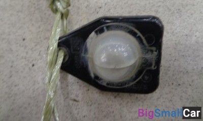 Фонарь подсветки номера от Lincoln Navigator 2002-2006